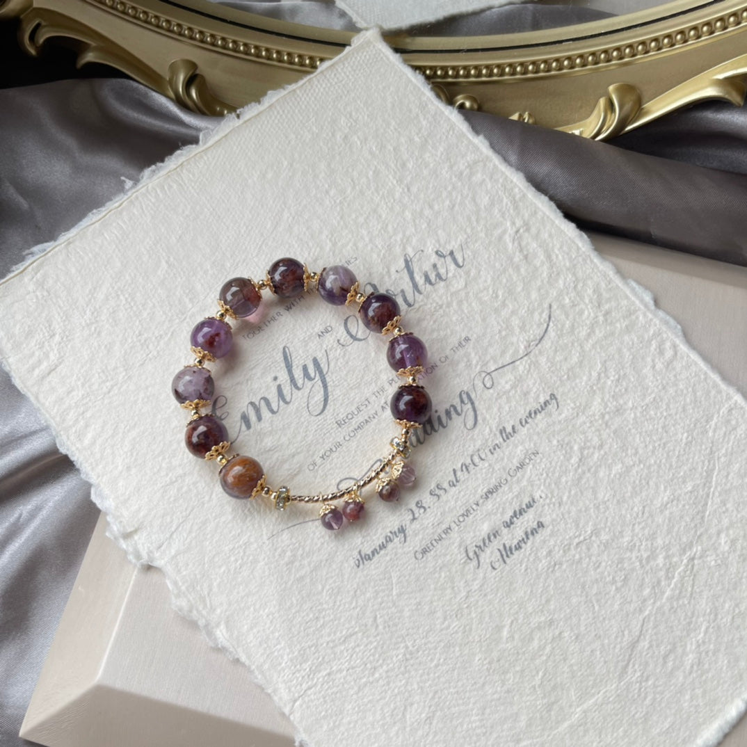 close-up of charoite crystal beads for emotional healing
