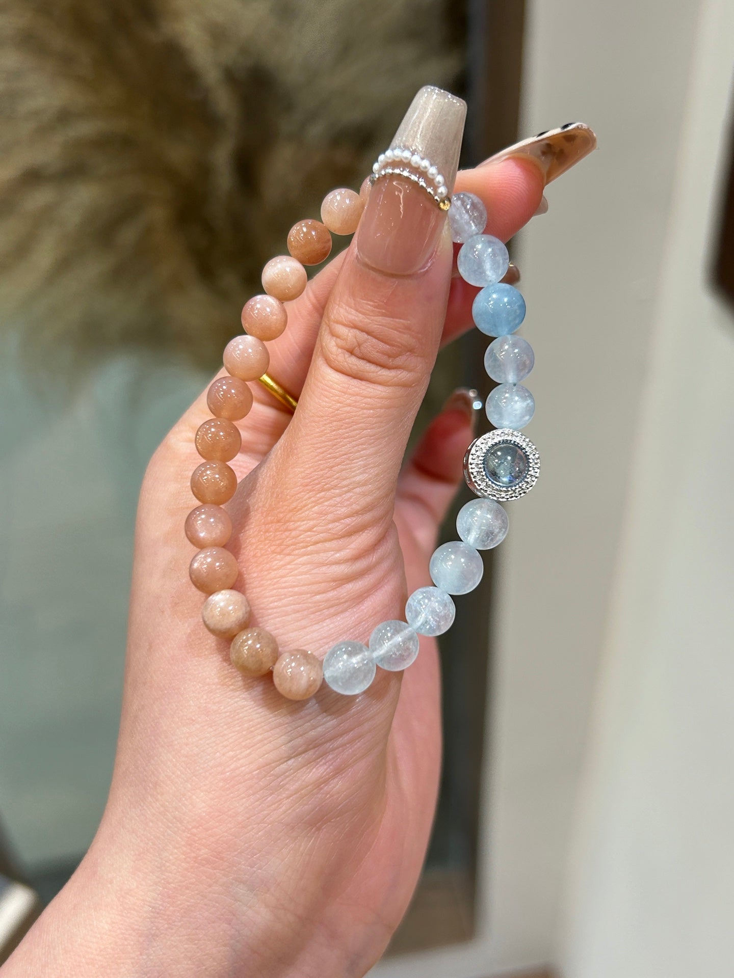 Wearing calming aquamarine bracelet with feminine energy