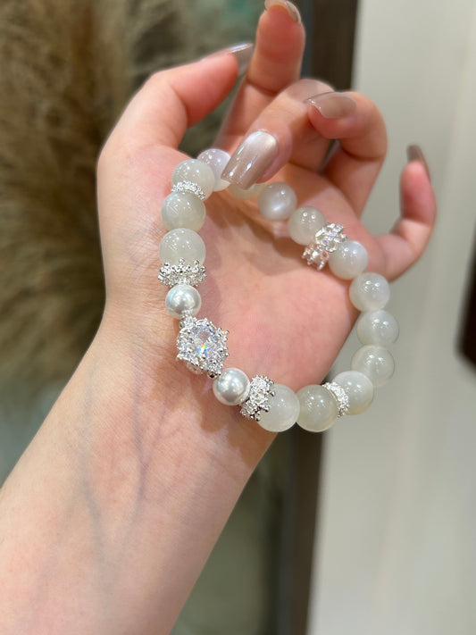 Wearing handmade white moonstone crystal bracelet for women