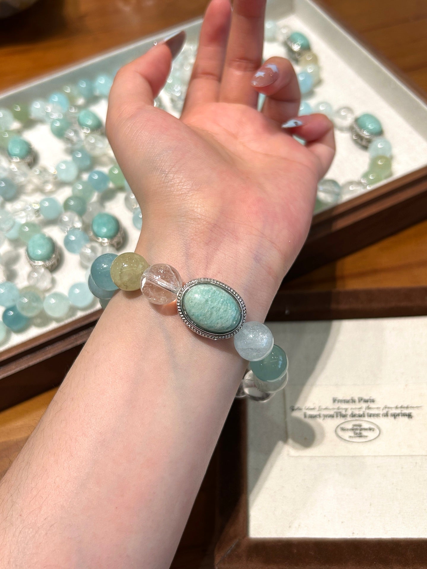 Wearing aquamarine crystal bracelet for emotional clarity